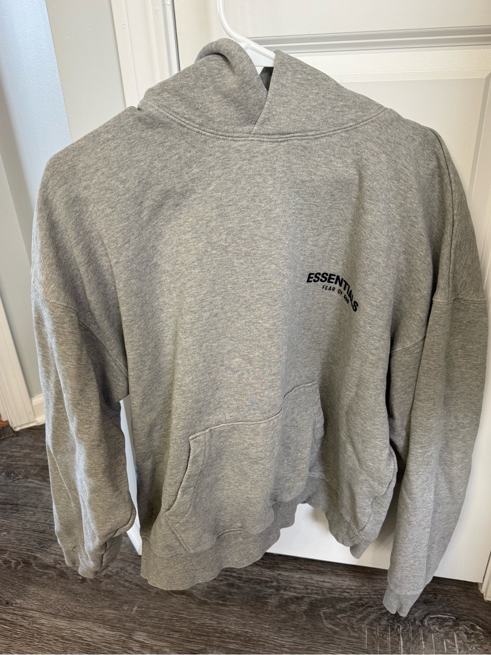 Essentials Grey Pullover Hoodie with Small Chest Logo